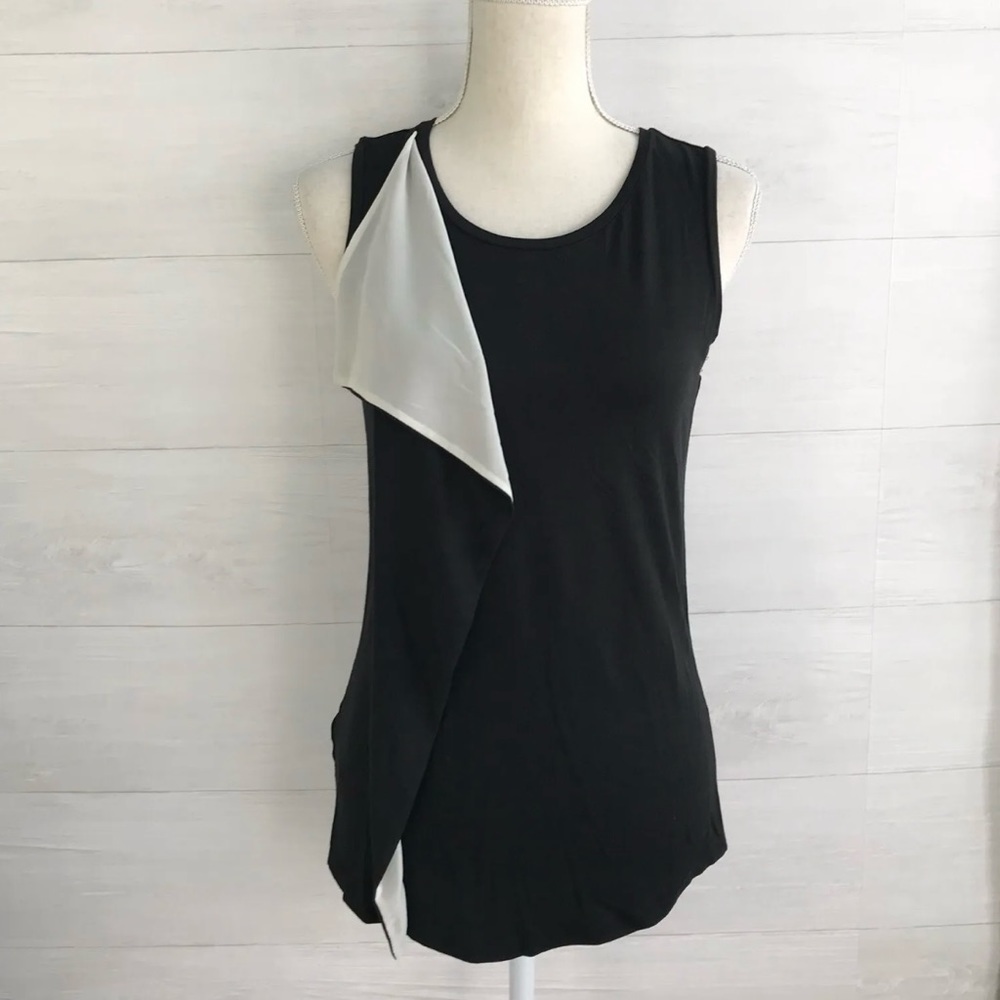 Ann Taylor - Black sleeveless ruffle front top